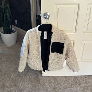 NWTZ supply reversible jacket, size small